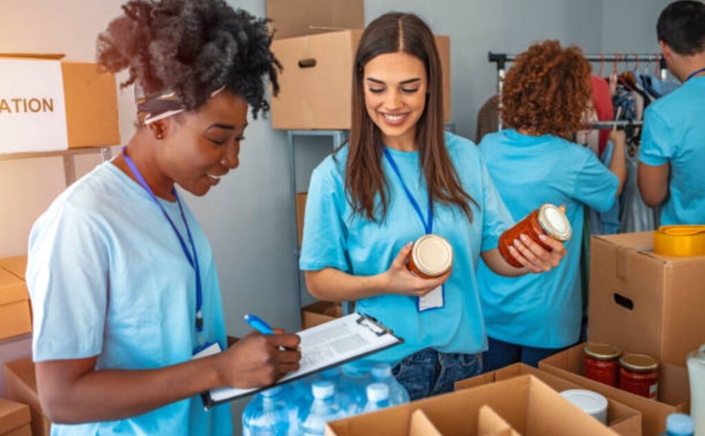 Team preparing aid boxes for a community in need