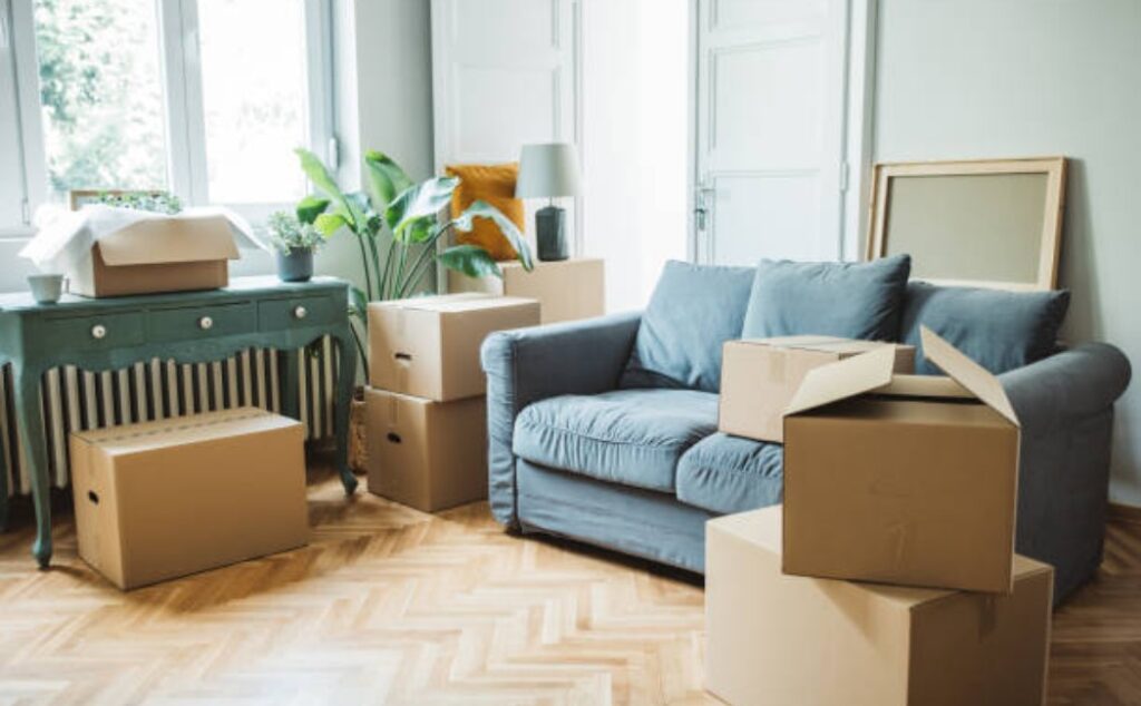 Unpacking services help organize boxes in a modern home