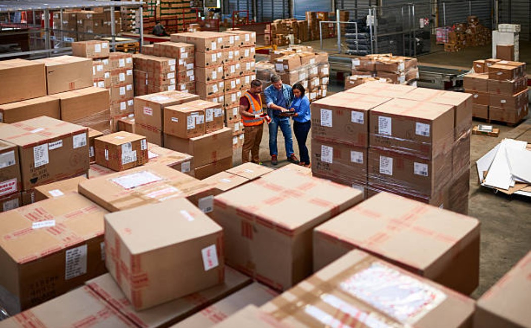 Person searching for a specific item on store shelves.