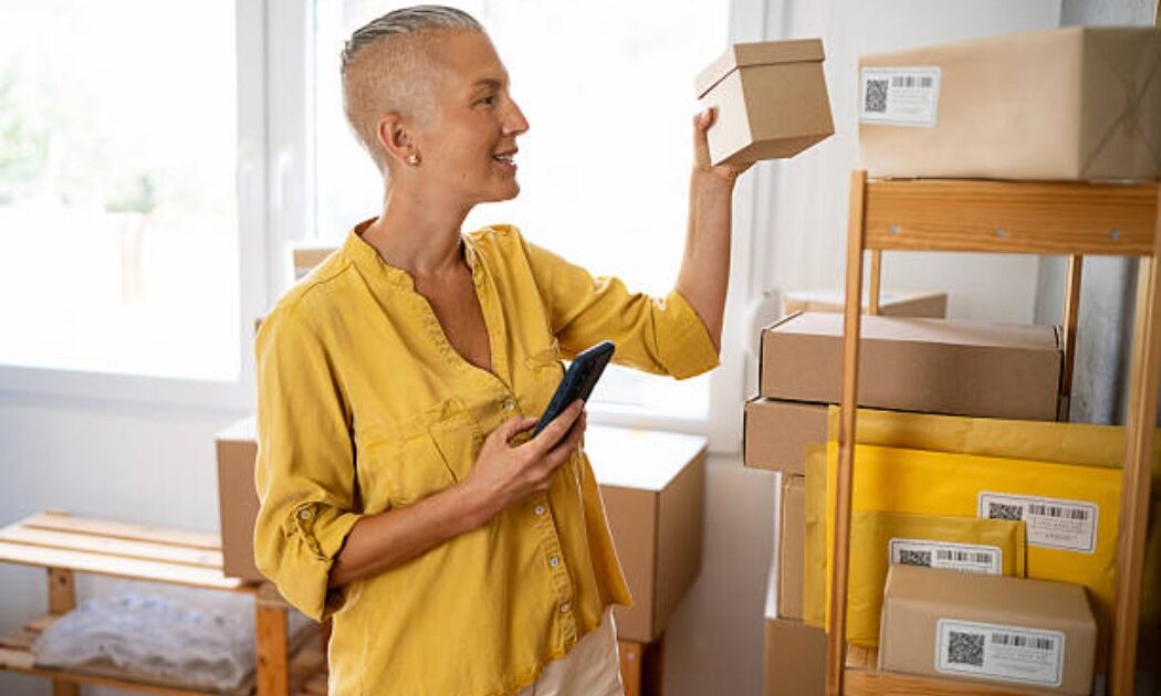 Home shipping business setup with boxes and inventory for orders