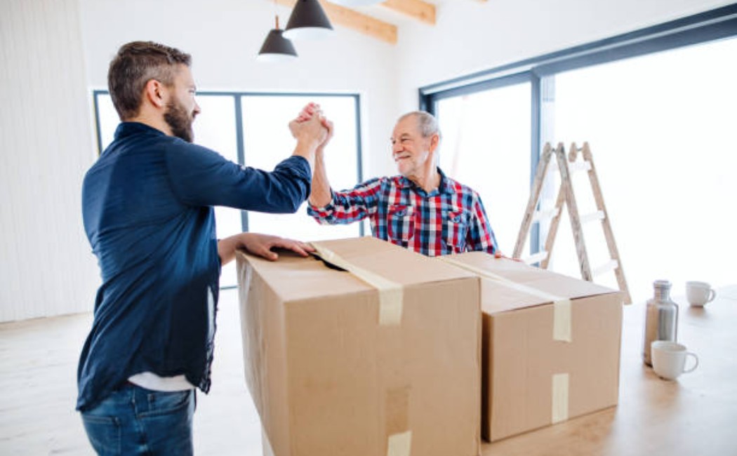 Senior Moving and Storage Assistance by Silver Fox Senior Movers Silver Fox Senior Movers assisting seniors with storage containers and organized moving services during relocation